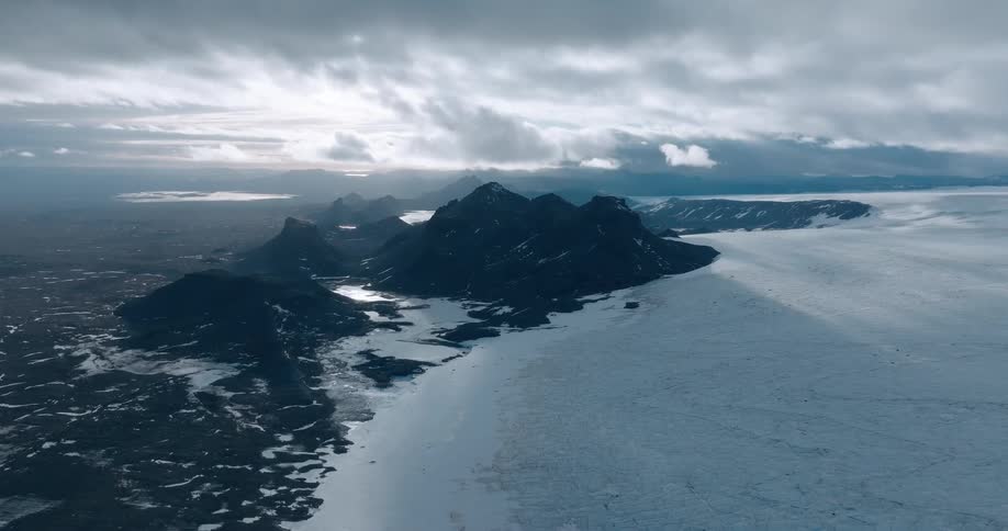 The water is frozen around the island