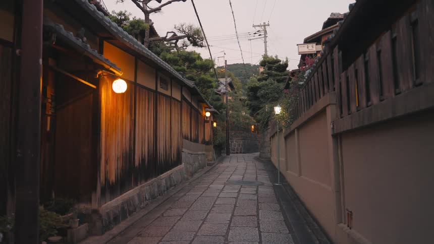 A narrow street in Kyoto at dusk