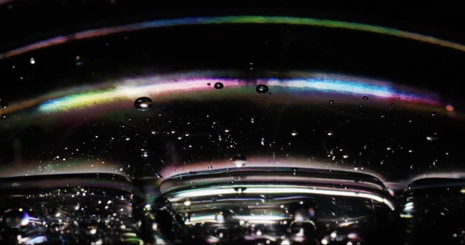 The surface of a viscous liquid with a bursting bubble