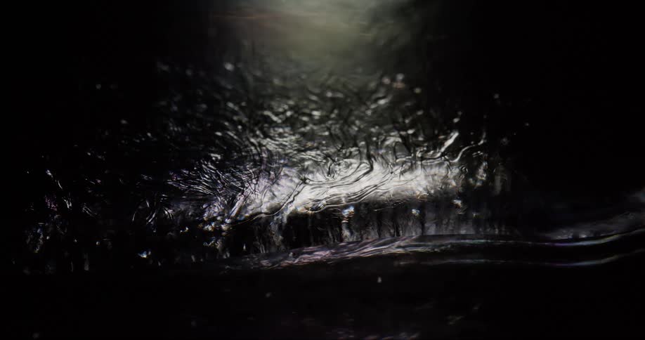 The light is reflecting on the liquid