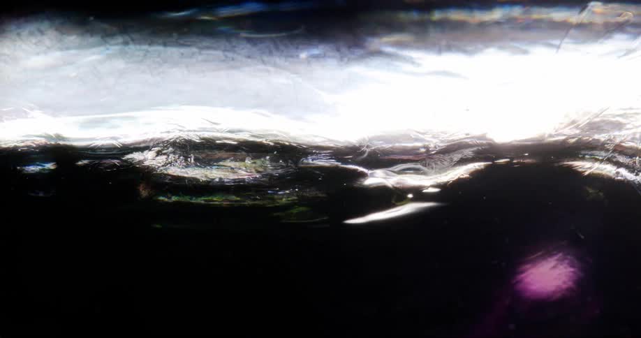 Dense liquid in slow motion abstract