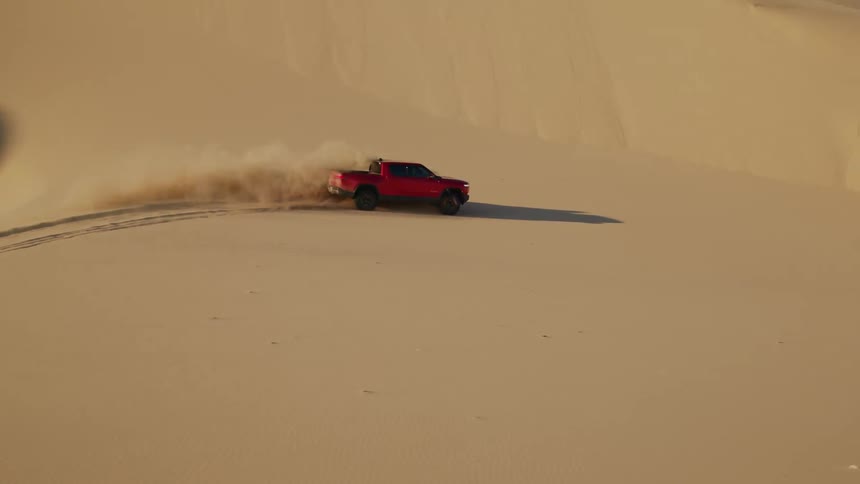 A clip of a truck turning around in the desert