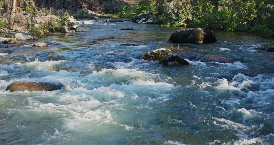 A river runs through a rapid