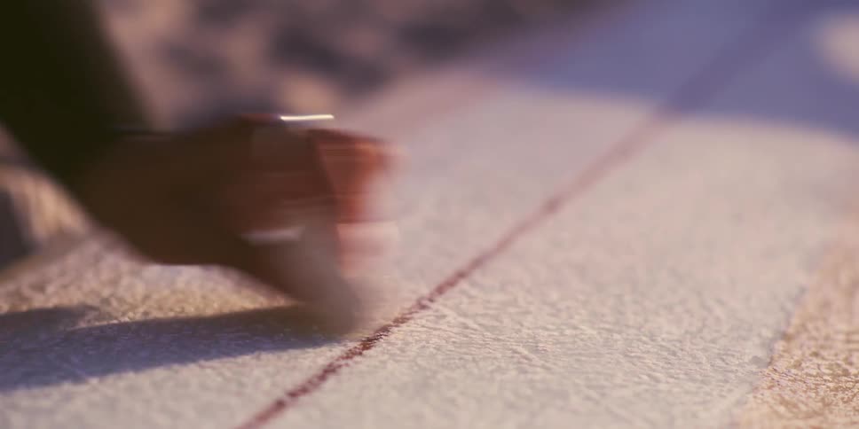 A clip of an hand painting with a chalk