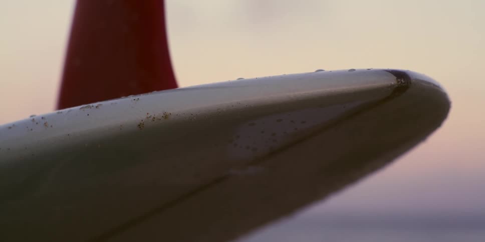 A close up of a plane wing outdoors