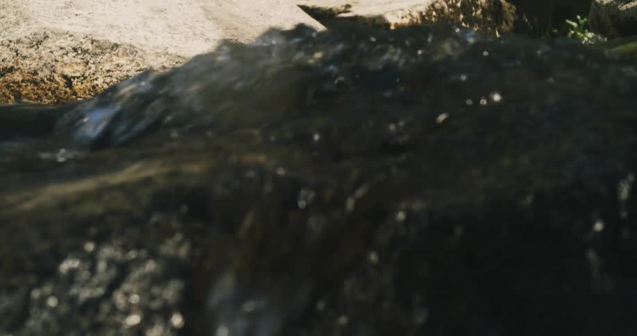 Water runs through a rapid