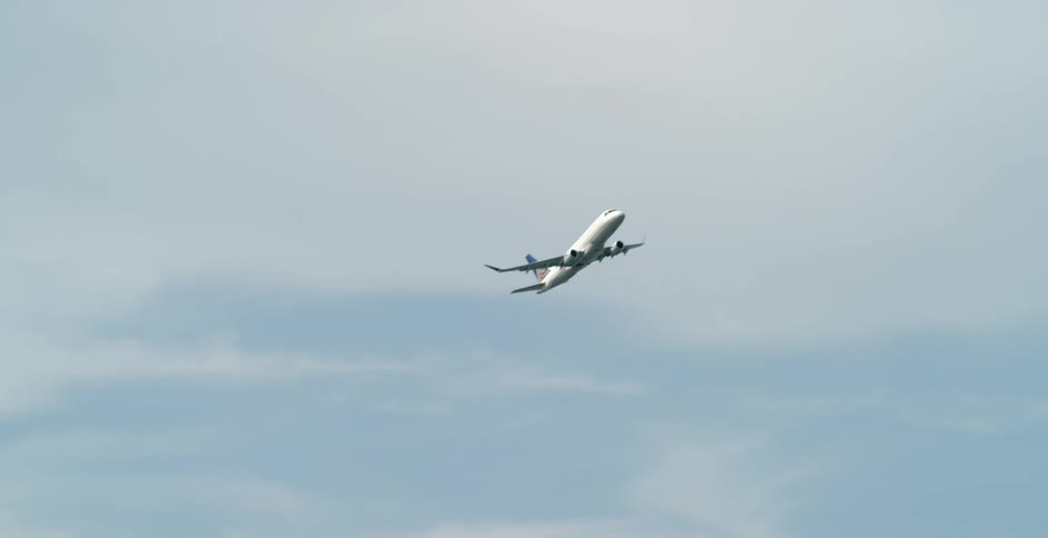 An airplane ascends into the sky