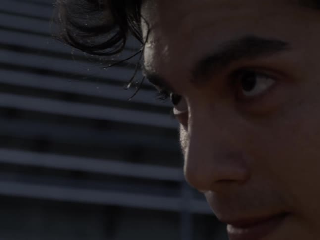 Close up of a latino athlete with a determined look on his face