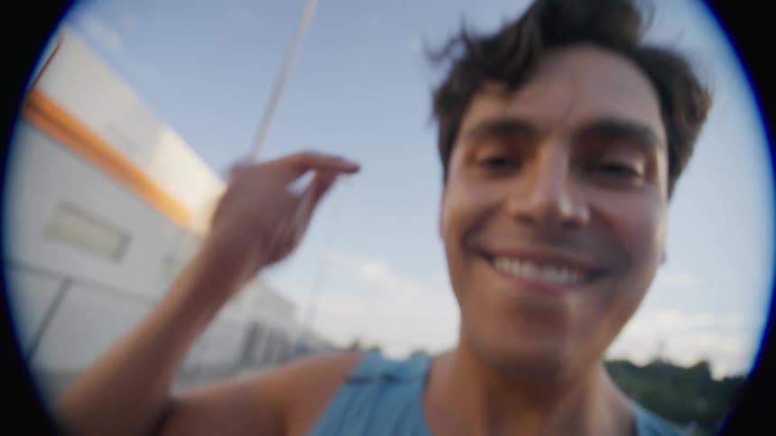A smiling teenager in a stadium