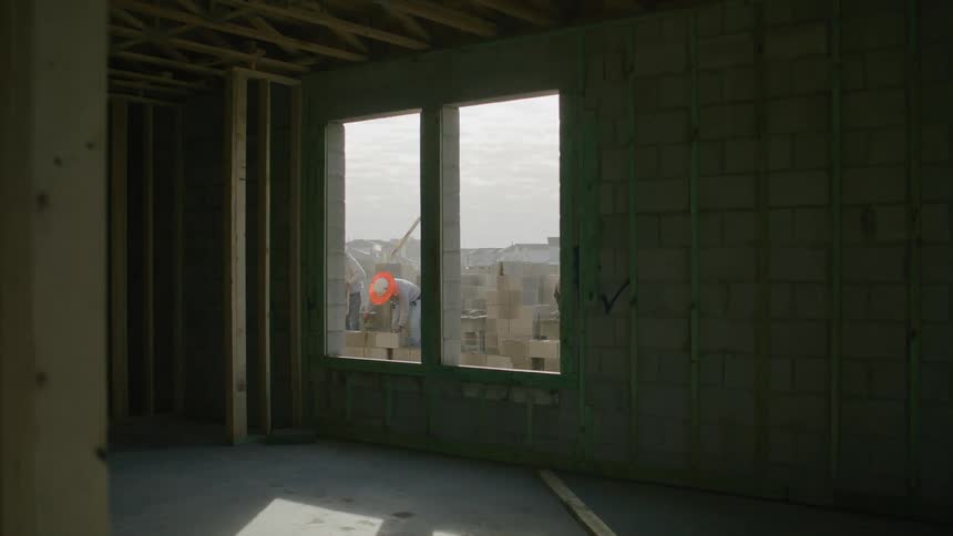 Workers performing construction work