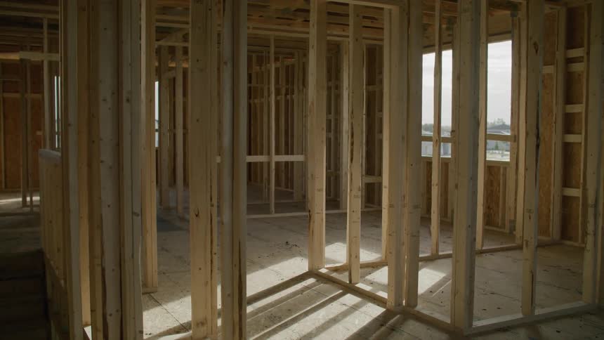 A house at the framing stage of construction