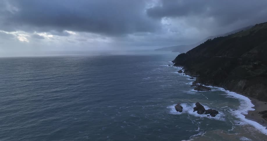 Aerial landscape of a seaside peninsula on a cloudy day