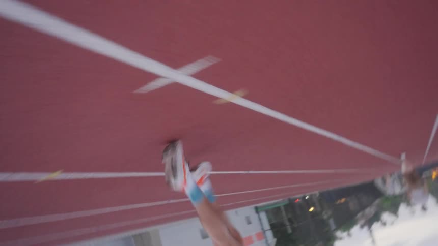 A man running on tracks