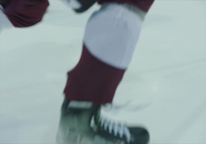 Athletes competing in a hockey game