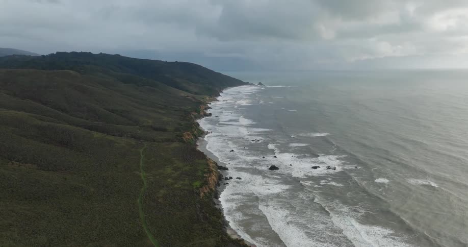 Aerial landscape of a seaside peninsula on a cloudy day