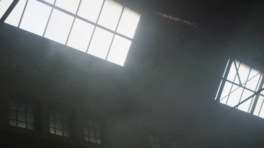 Dirty and foggy windows of a building during the day