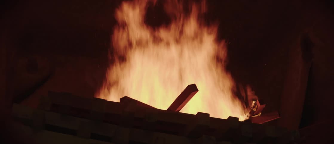 Bonfire inside a house at night