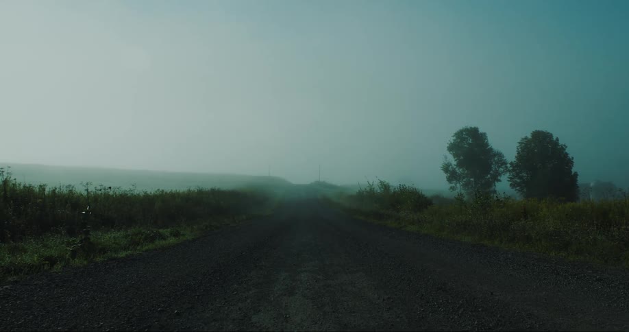A road runs through flat terrain