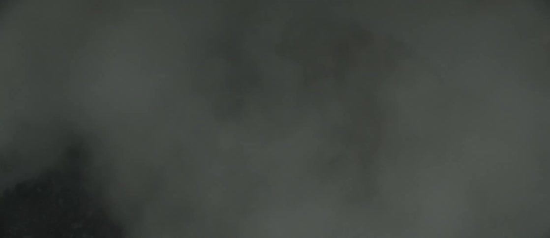 Smoke around a rock