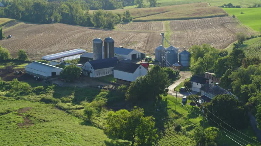 Aerial panorama of a farm with agriculture around
