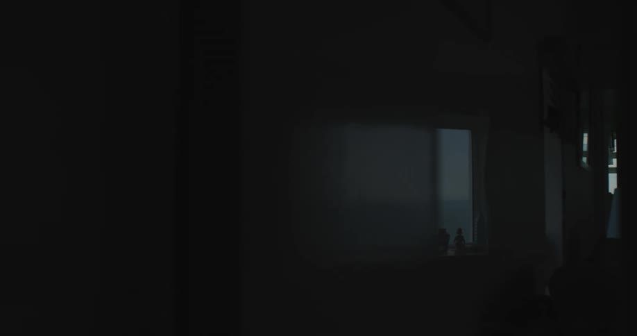 Indoor silhouette of a house with a window overlooking the sea on a morning