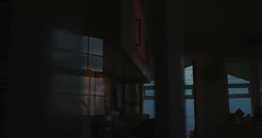 Dawn of the day inside a mirrored kitchen