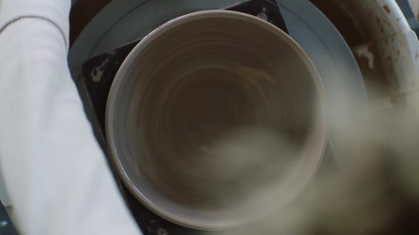 Making of a bowl on a sculpting wheel