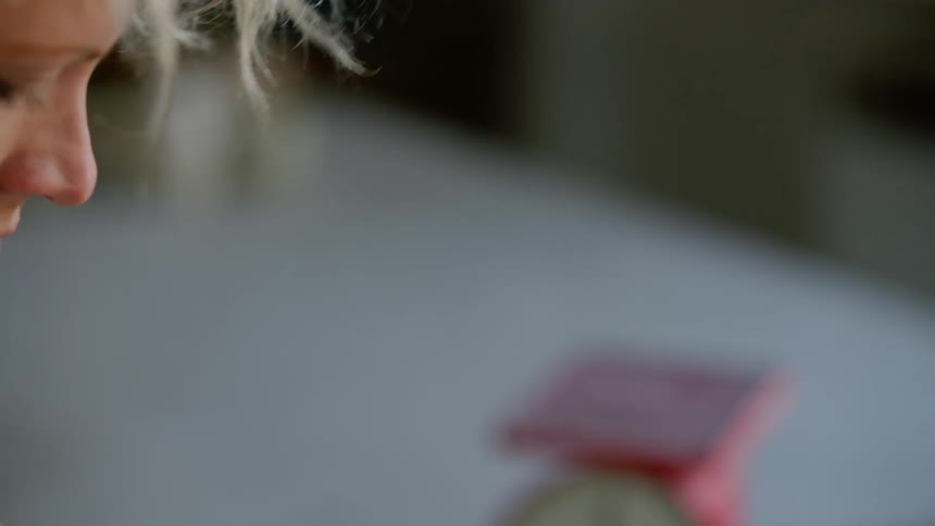 Side portrait of a concentrated woman doing physical effort