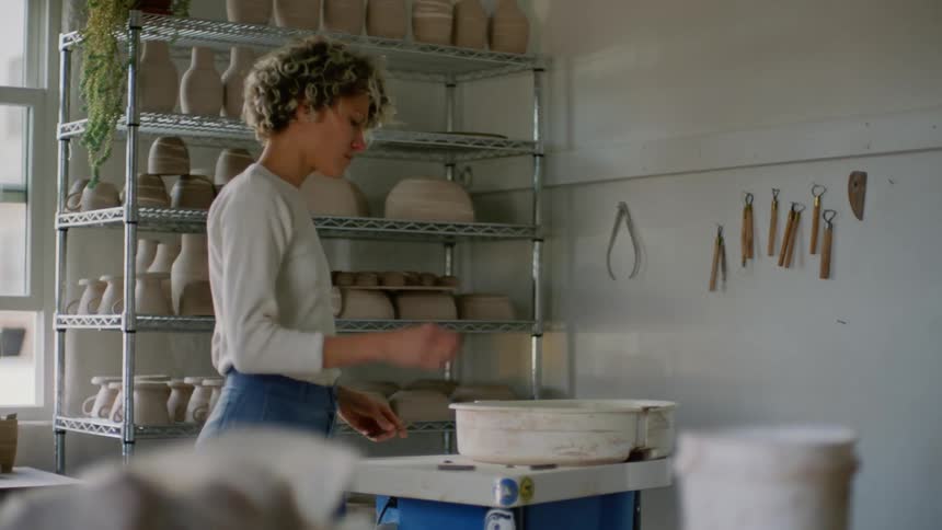 Woman in her workplace organizing her utensils