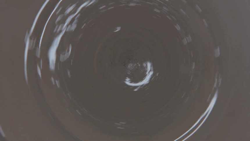 A view of water swirling in a bowl