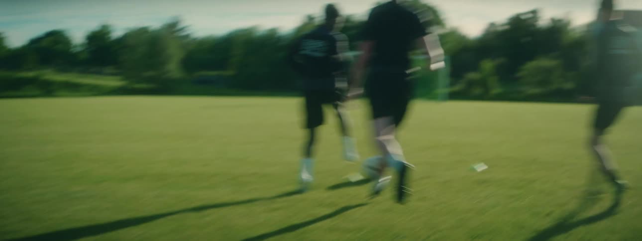 A group of men playing soccer