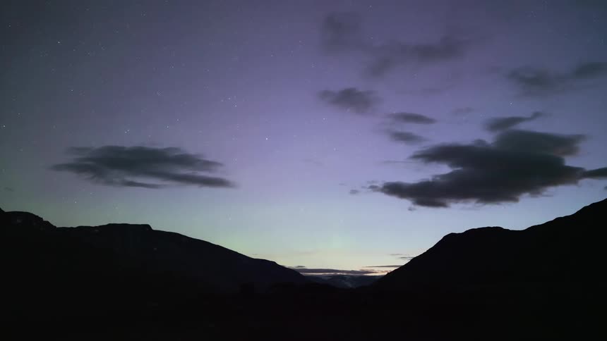 Aerial of a mountain range at dusk