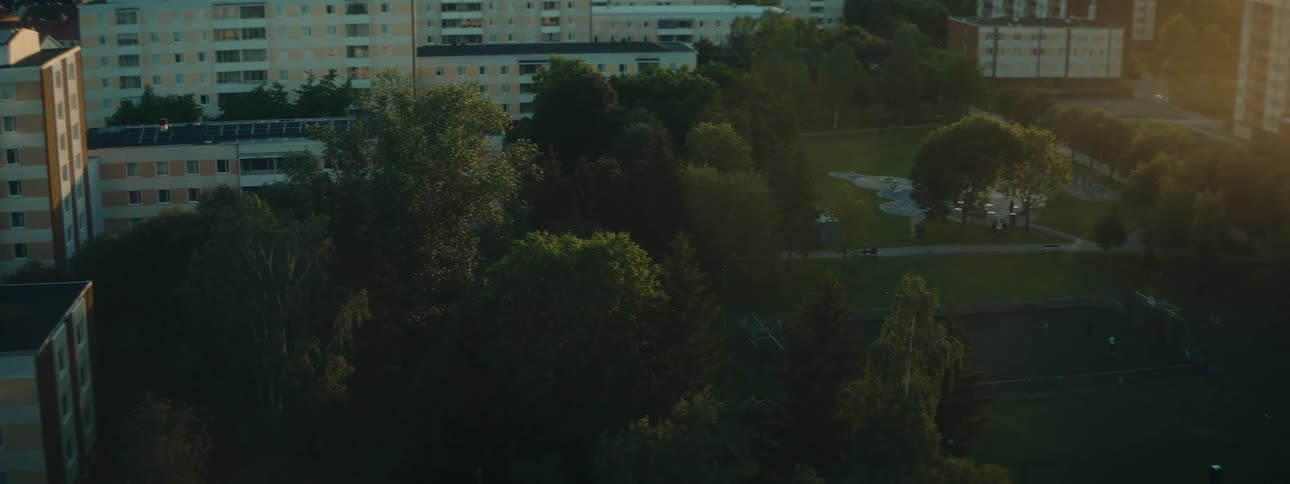 Aerial of a park in a neighborhood during sunset