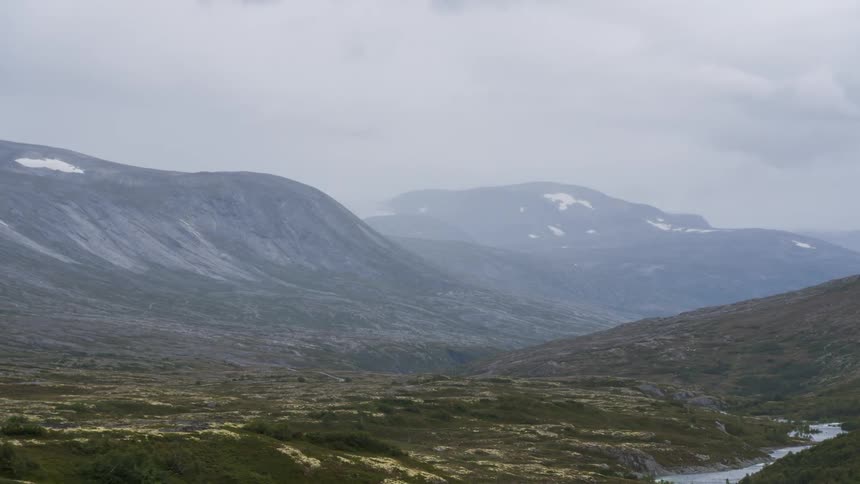 Natural landscape of mountain ranges on a cloudy day