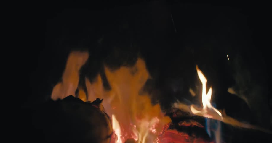 Bonfire with ember on fire at night
