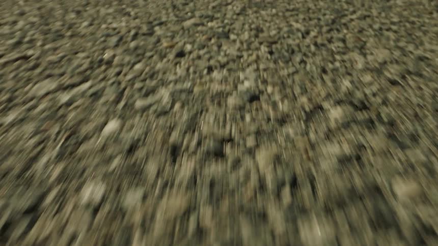 Gravel covers the ground