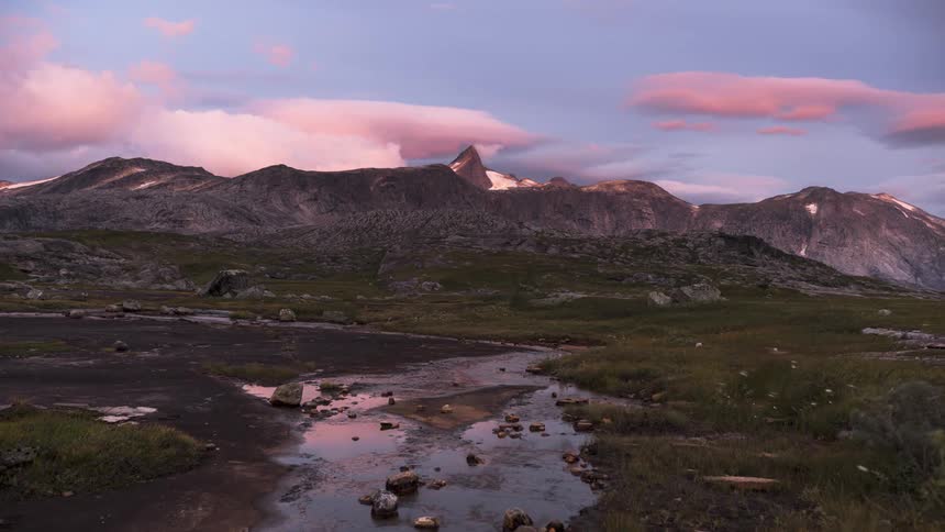 Natural landscape of mountain ranges with sky in timelapse