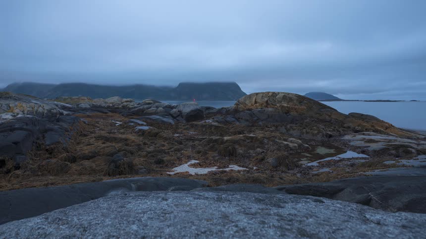 High tide on the rocky shore of a beach