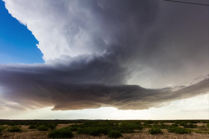 Time lapse of dark storm clouds rolling over the plains