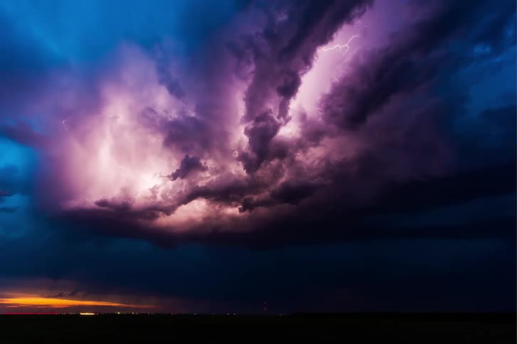 Strong thunderstorms light up the sky