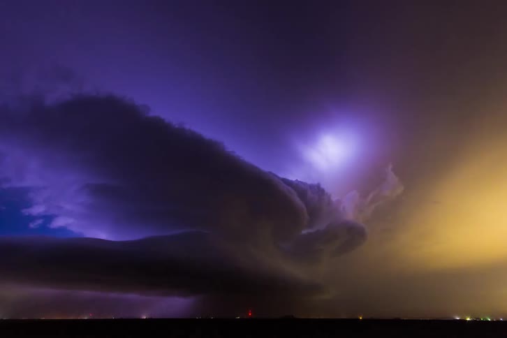 Night timelapse of supercell forming with lightning