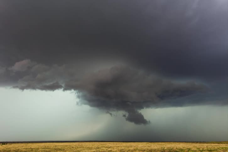 A storm of clouds and lightning in the field