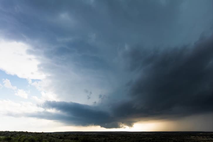 Dark storm clouds gather in the sky