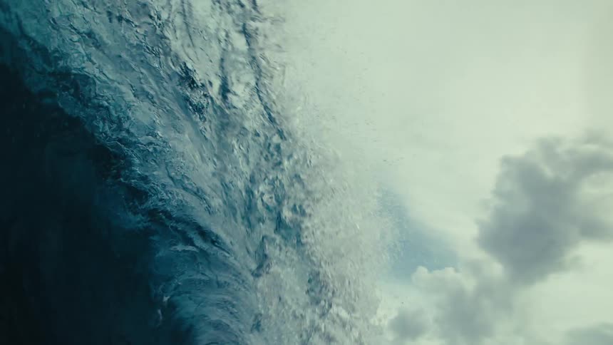 Wave breaking in the sea on a cloudy day