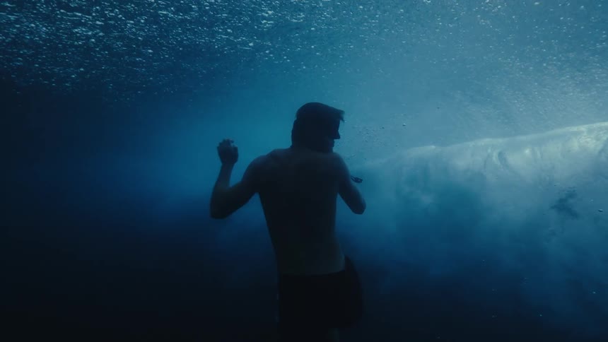A man swimming inside the sea water