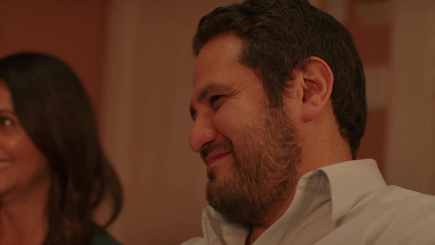 A man and woman sitting together