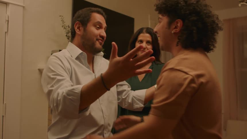 Parents greeting their son and meeting his girlfriend