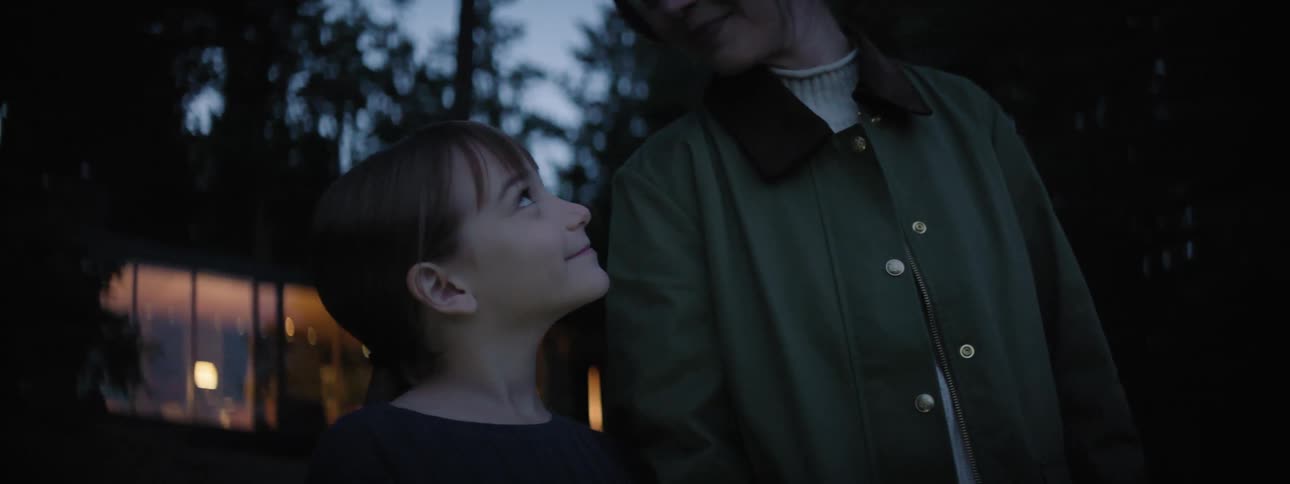 Portrait of mother and daughter and a forest in the late afternoon