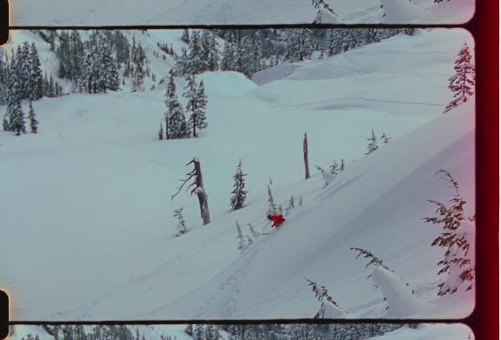 Person dancing a snowboard mountain