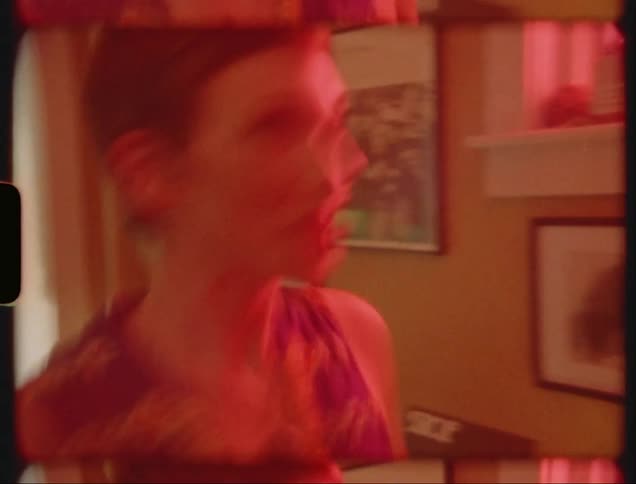 A couple in love dancing in their living room